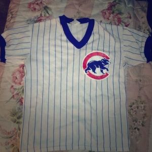 Cubs, jersey shirt.  Blue stripes with red